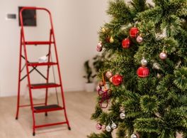 Decorating Christmas Tree with Ladder