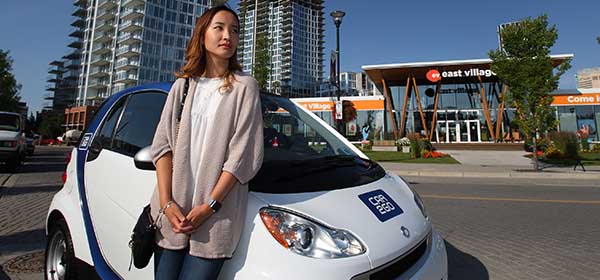 Jennifer Lee, 21, has primarily used transit to get around Calgary since moving to the city two years ago. She says she has no plans to own a car, insteading using Car2go when necessary. Photo by Wil Adruschak/For CREB®Now