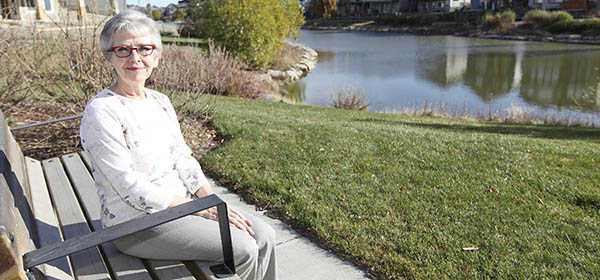 Convenience, location and amenities drew Laura Routledge, 61, from her larger home in Chestermere to the Bayside Rivairo Townhome Community in Airdrie. Photo by Carl Patzel/For CREB®Now